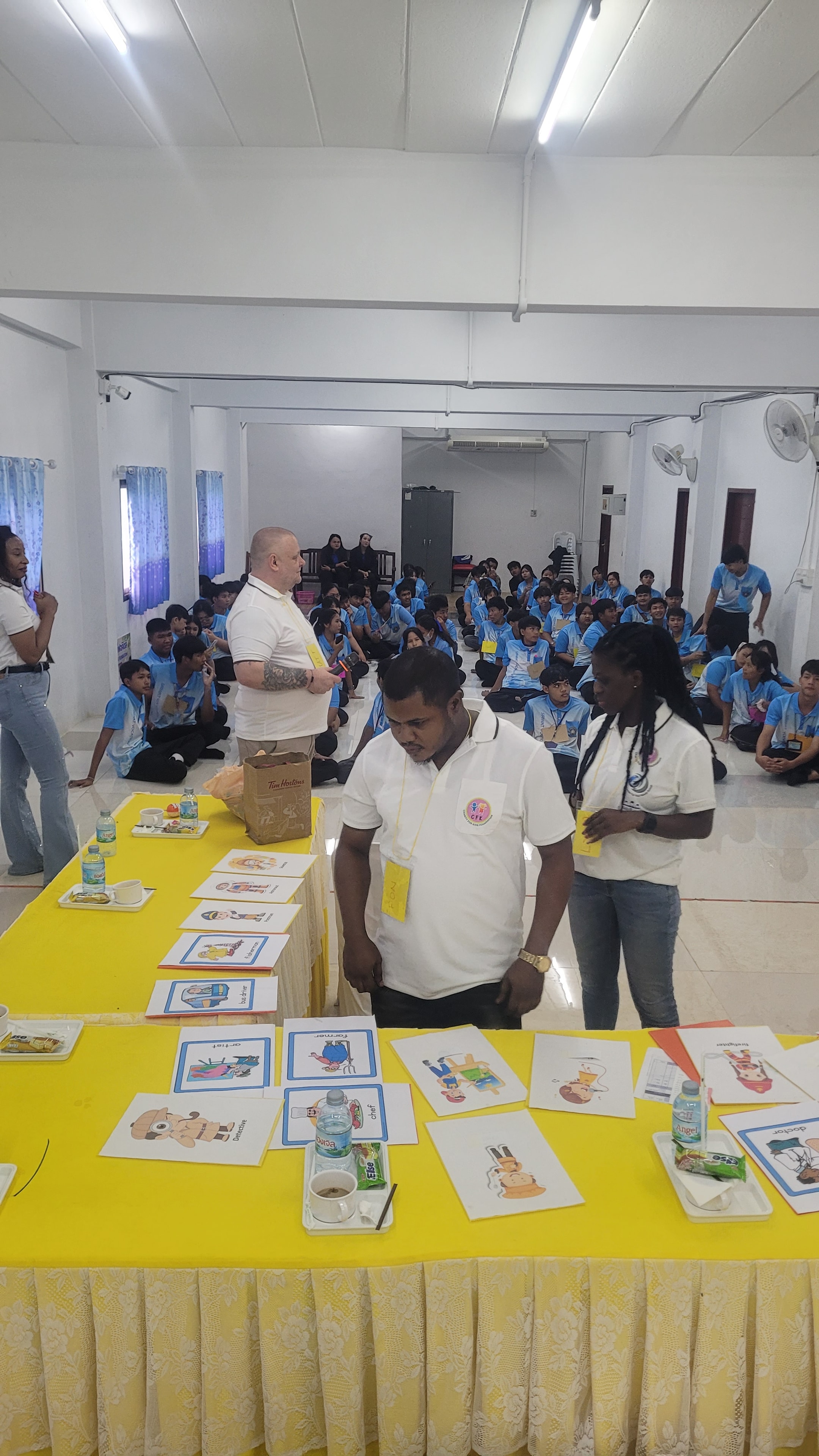 Volunteers teaching English to students at Siriwat Vocational School